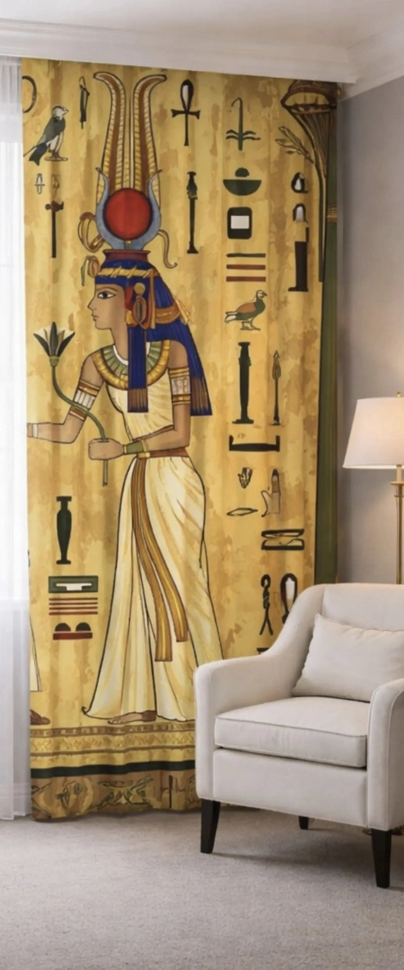 right side view of Decorative curtain with Egyptian-themed design in a room with a white armchair.