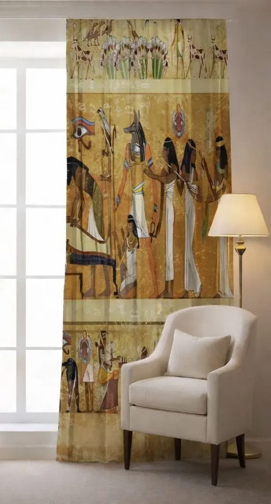 Decorative curtain with Egyptian-themed design in a room with a chair and lamp.