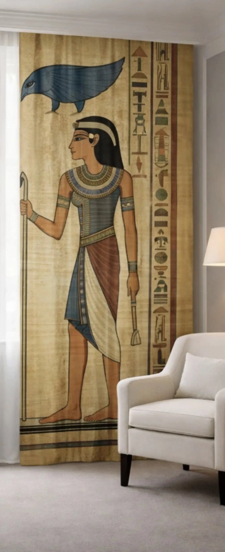 right view of Decorative wall hanging with Egyptian-themed design in a room with a white armchair.