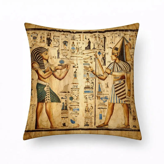 Decorative pillow with Egyptian-themed design on a white background