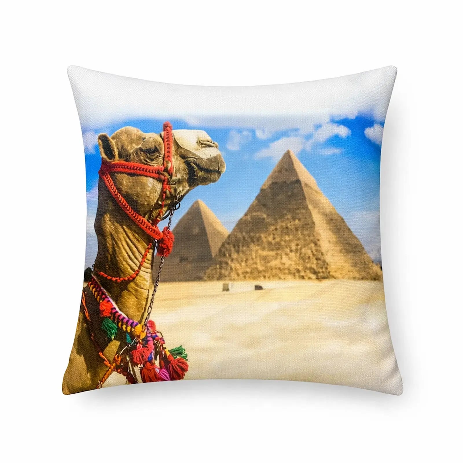 Pillow with a camel and pyramids design on a white background