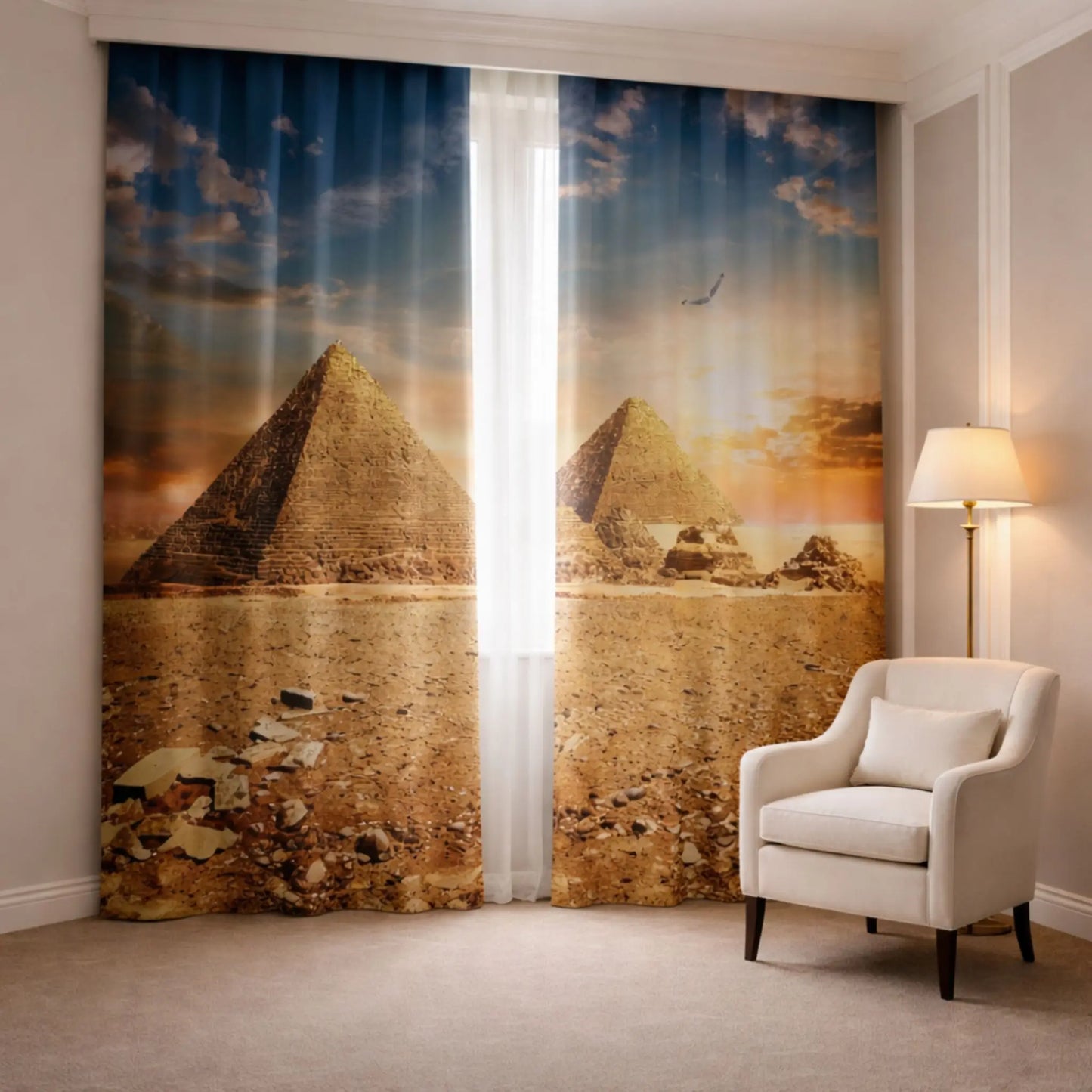 Room with Egyptian pyramid-themed curtains and a white armchair.