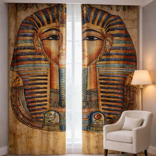 Decorative curtains with Tutankhamun design in a room with a chair and lamp.